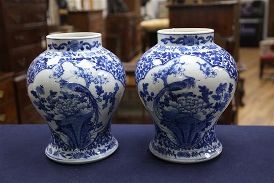 A pair of large Chinese blue and white baluster jars and covers, Kangxi marks, late 19th century, 41.5cm